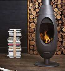 Печь-камин Invicta OVE стальная в интерьере Амазонка бай фото в Пинске