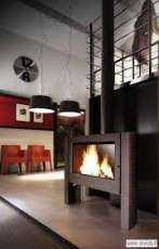 Печь-камин Invicta Antaya в интерьере чугунная Амазонка бай фото в Пинске