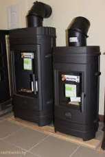 Печь-камин чугунный Invicta Remilly в интерьере Амазонка бай фото в Пинске