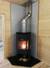 Недорогой камин с отделкой шамотом Сибирь 12 фото в интерьере в Пинске