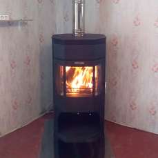 Недорогой камин с отделкой шамотом Сибирь 12 фото в интерьере в Пинске