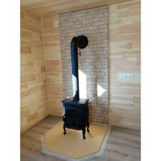 Чугунный камин со стеклом Сибирь 7 фото в интерьере в Пинске