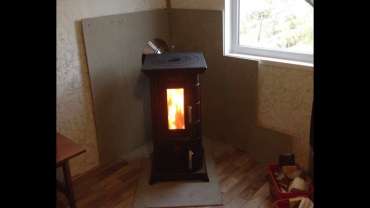 Отопительная печь Термофор Статика Тетра, чёрная бронза фото в интерьере в Пинске