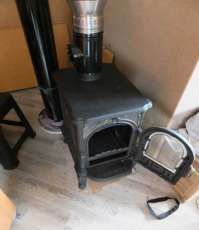 Недорогой печь-камин со стеклом Сибирь 6 фото в интерьере в Пинске