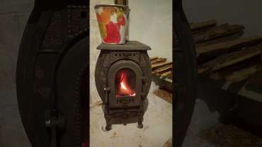 Печь отопительно-варочная чугунная "Сибирь" фото в интерьере в Пинске