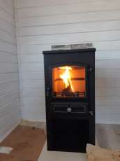 Стальной печь-камин со стеклом ЭТНА (БКД) с плитой фото в Пинске