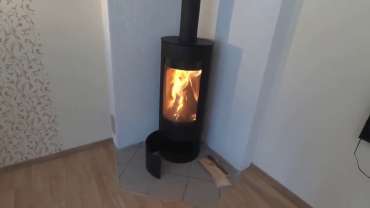 Стильная печь-камин с шамотом Мета-Бел Селигер в Пинске фото в интерьере в Пинске