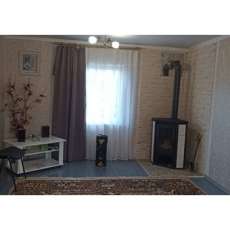 Стальной камин с шамотом Мета-Бел Ритм L фото в интерьере в Пинске