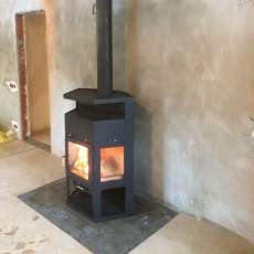 Купить недорогой камин с шамотом Мета-Бел Енисей в Пинске фото в интерьере в Пинске