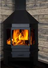 Печь-камин Бавария Мюнхен пристенно-угловой черный фото в интерьере в Пинске