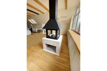 Стальной камин Эклипс островной 4D графит фото в интерьере в Пинске