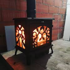 Печь-камин чугунный FireWay Demetra в интерьере Амазонка бай фото в Пинске