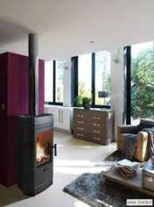 Печь-камин чугунный Invicta Gomont в интерьере Амазонка бай фото в Пинске