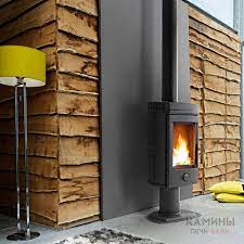 Печь-камин чугунный Invicta Mesnil в интерьере Амазонка бай фото в Пинске