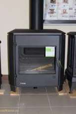 Печь-камин чугунный Invicta Carolo в интерьере Амазонка бай фото  в Пинске