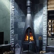 Печь-камин чугунный Invicta Pow-Wow в интерьере Амазонка бай фото в Пинске