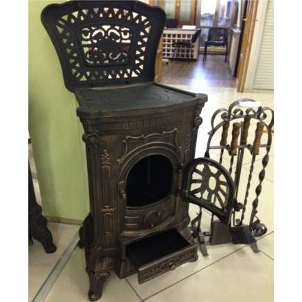 Печка чугунная Амбра в интерьере Амазонка бай фото в Пинске